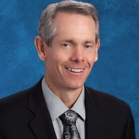Dr. Justin Henry